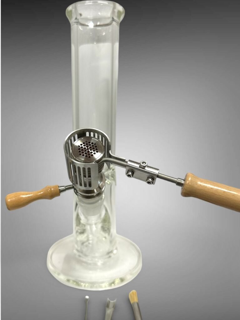 Ruby Twist Pro desktop ball vaporizer with glass water piece and wooden-handled tools